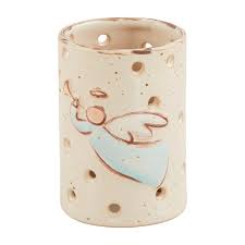 Ceramic vase with heart design on a white background