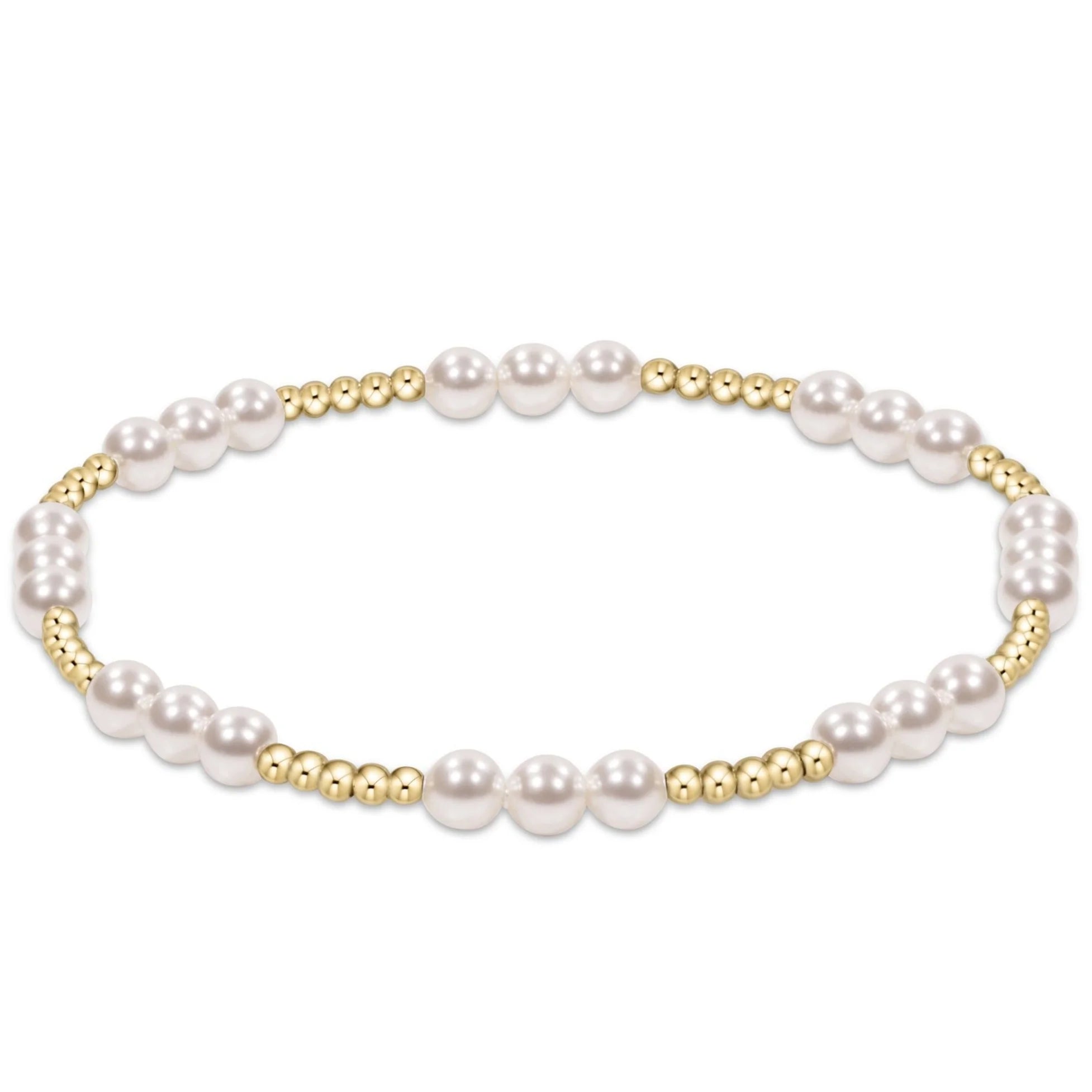 Pearl bracelet with gold accents on a white background