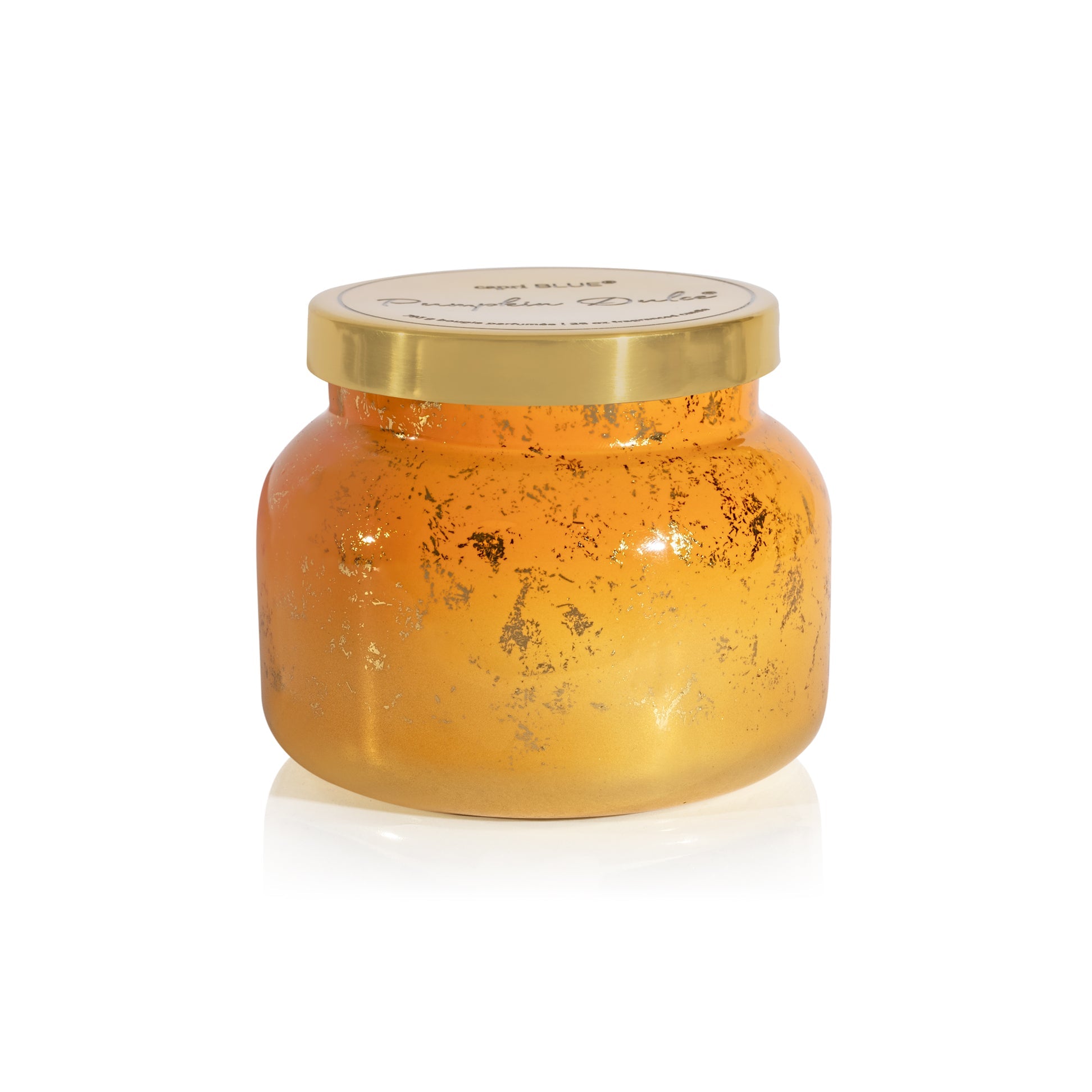 pumpkin dulce candle capri blue 
with a gold lid on a white background