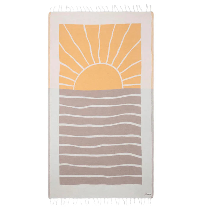 A beige, orange, and gray striped beach towel with a sun and wave pattern, displayed on a white background.