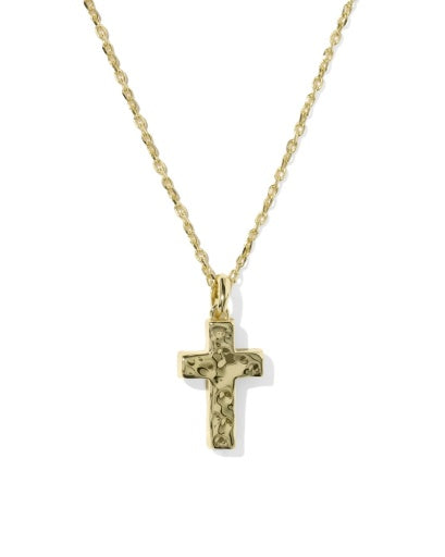 Gold cross pendant on a chain against a white background