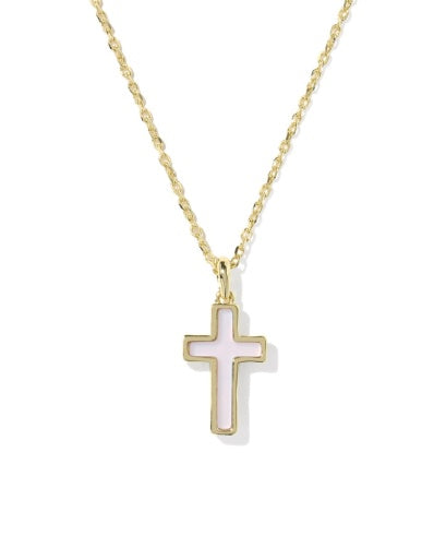 Gold cross necklace on a white background