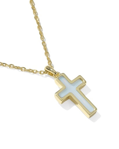 Gold cross pendant necklace on a white background