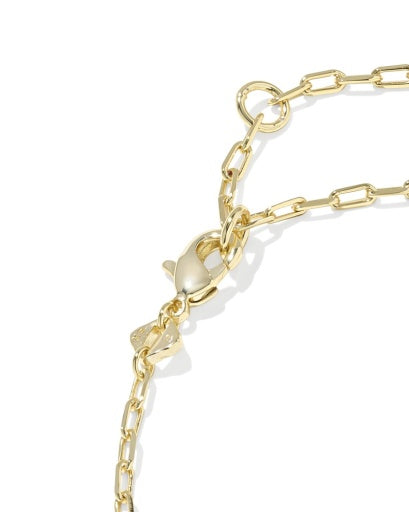 Gold chain bracelet on a white background