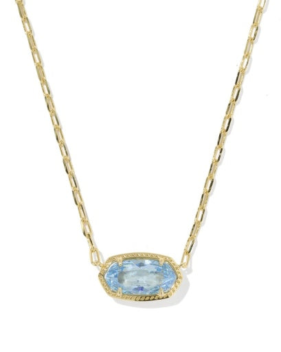Gold necklace with a blue gemstone pendant on a white background
