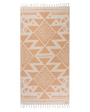 Patterned rug with geometric design on a white background