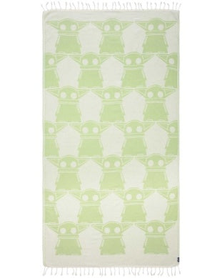 Green and white patterned towel with fringes on a white background