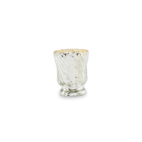 Clear glass candle holder with gold rim on a white background