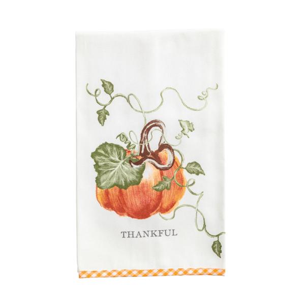 A white kitchen tea towel featuring a watercolor-style orange pumpkin with green leaves and vines, the word 'THANKFUL.' printed below, and an orange-and-white gingham border along the bottom edge.