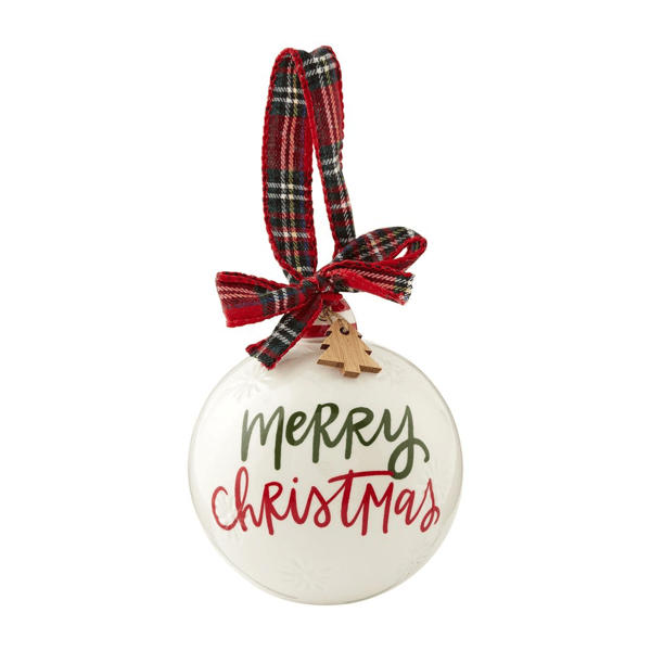 ceramic merry christmas ornament with tartan ribbon against white background
